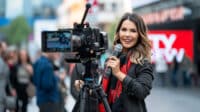 longleg cihuy beatiful woman holding a mic with the text TV New c e ada f afce longleg cihuy beatiful woman holding a mic with the text TV New c e ada f afce